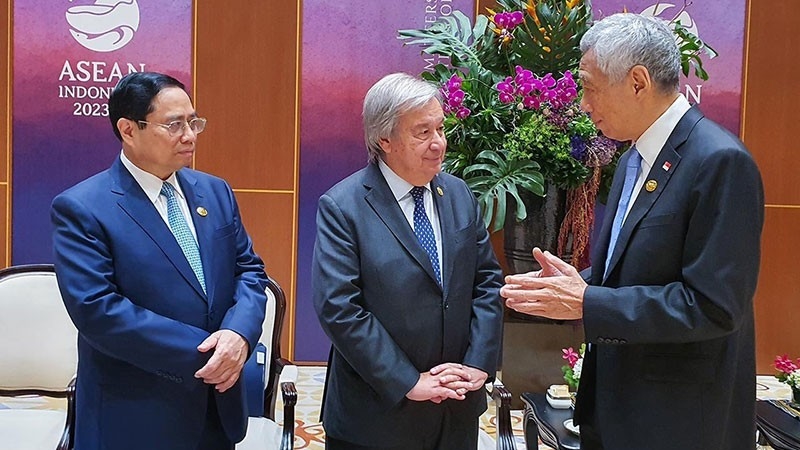 Thủ tướng Phạm Minh Chính gặp Thủ tướng Singapore và Tổng thư ký Liên hợp quốc